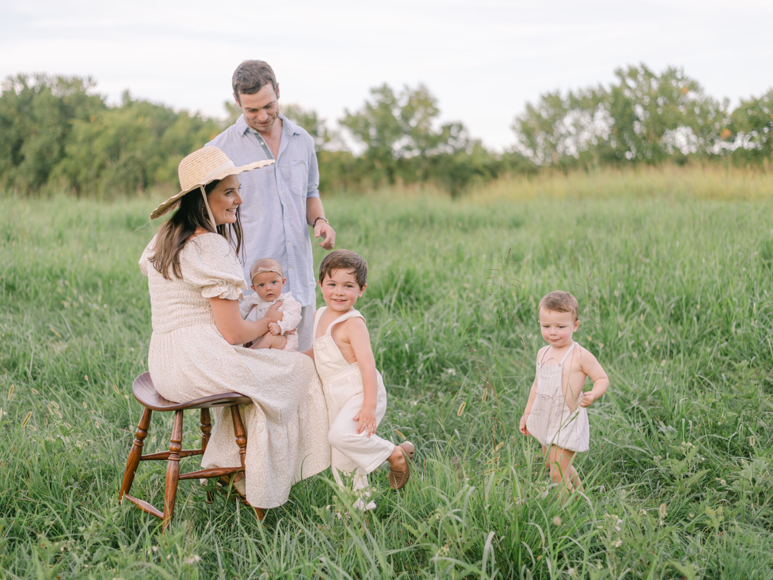 Family of five in open field during a session at one of the best photo locations in Fredericksburg Virginia