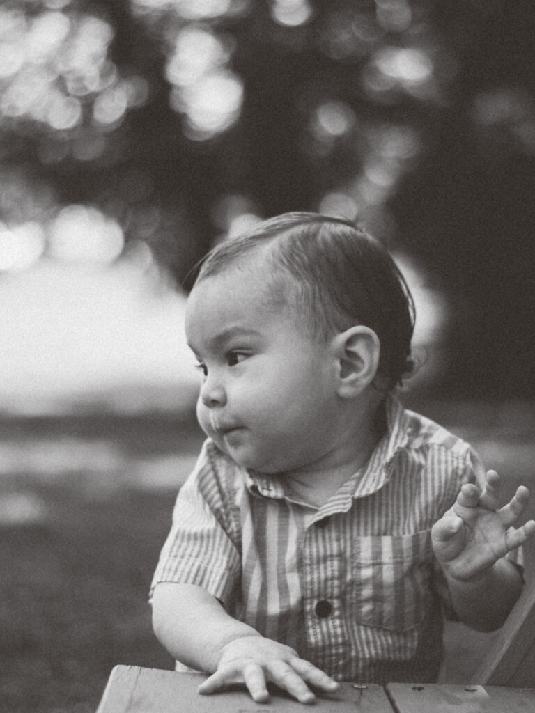 Profile photo of little boy in black and white.